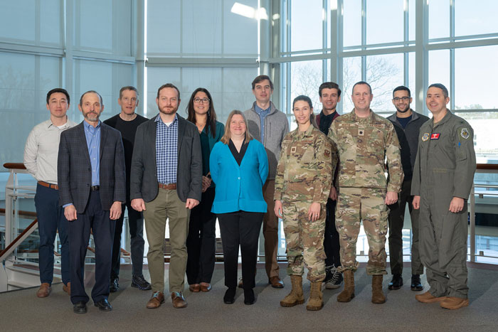 Group photo with air force members and researchers